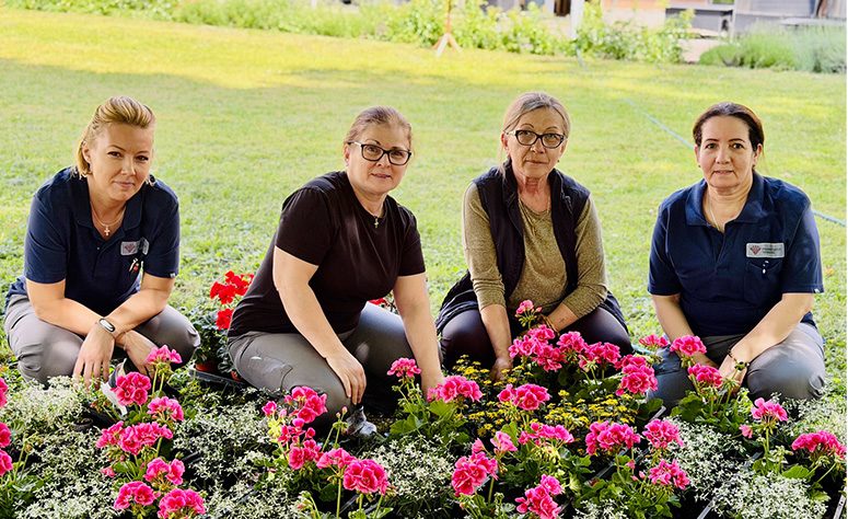 Team im Garten